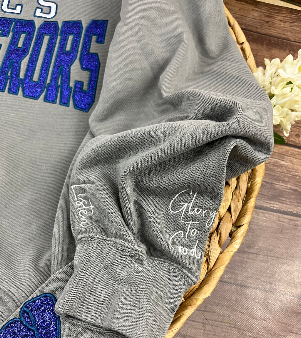 School spirit team sweatshirt with glitter applique and side bows - detail view