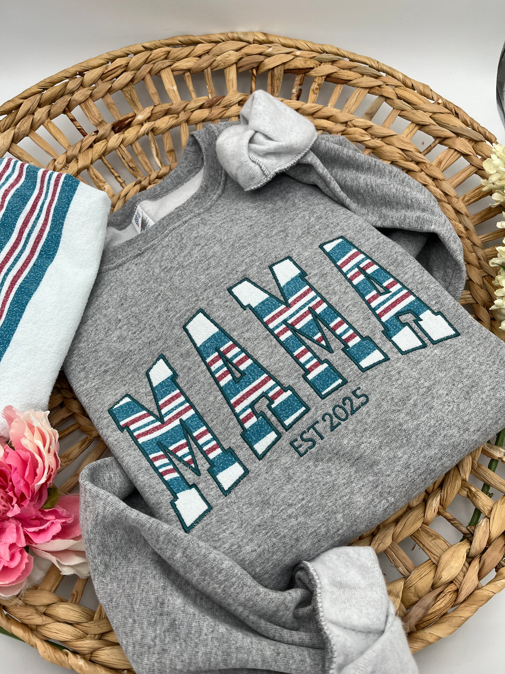 Curved Mama keepsake sweatshirt appliqued from baby clothes - side view