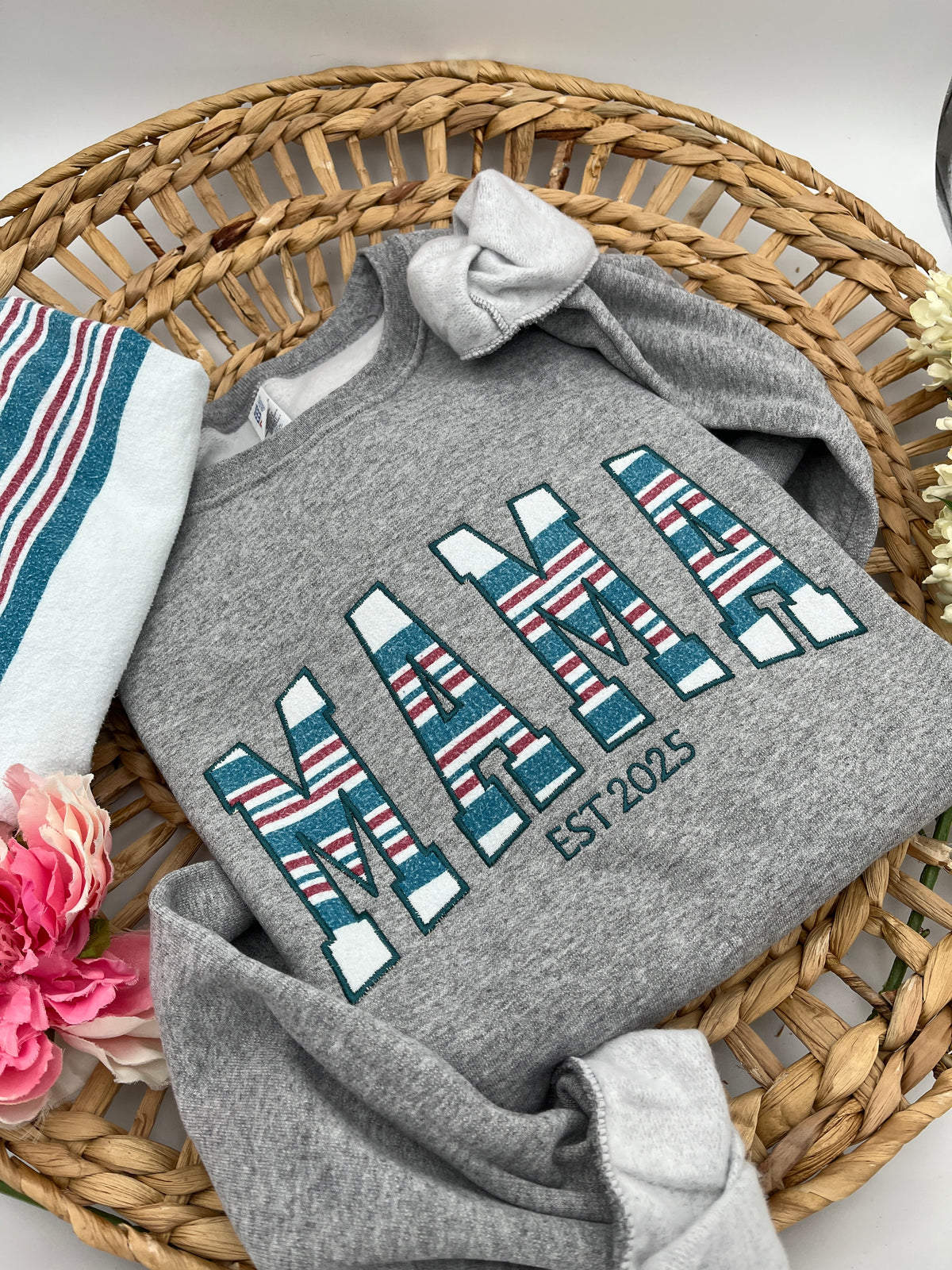 Curved Mama keepsake sweatshirt appliqued from baby clothes - side view