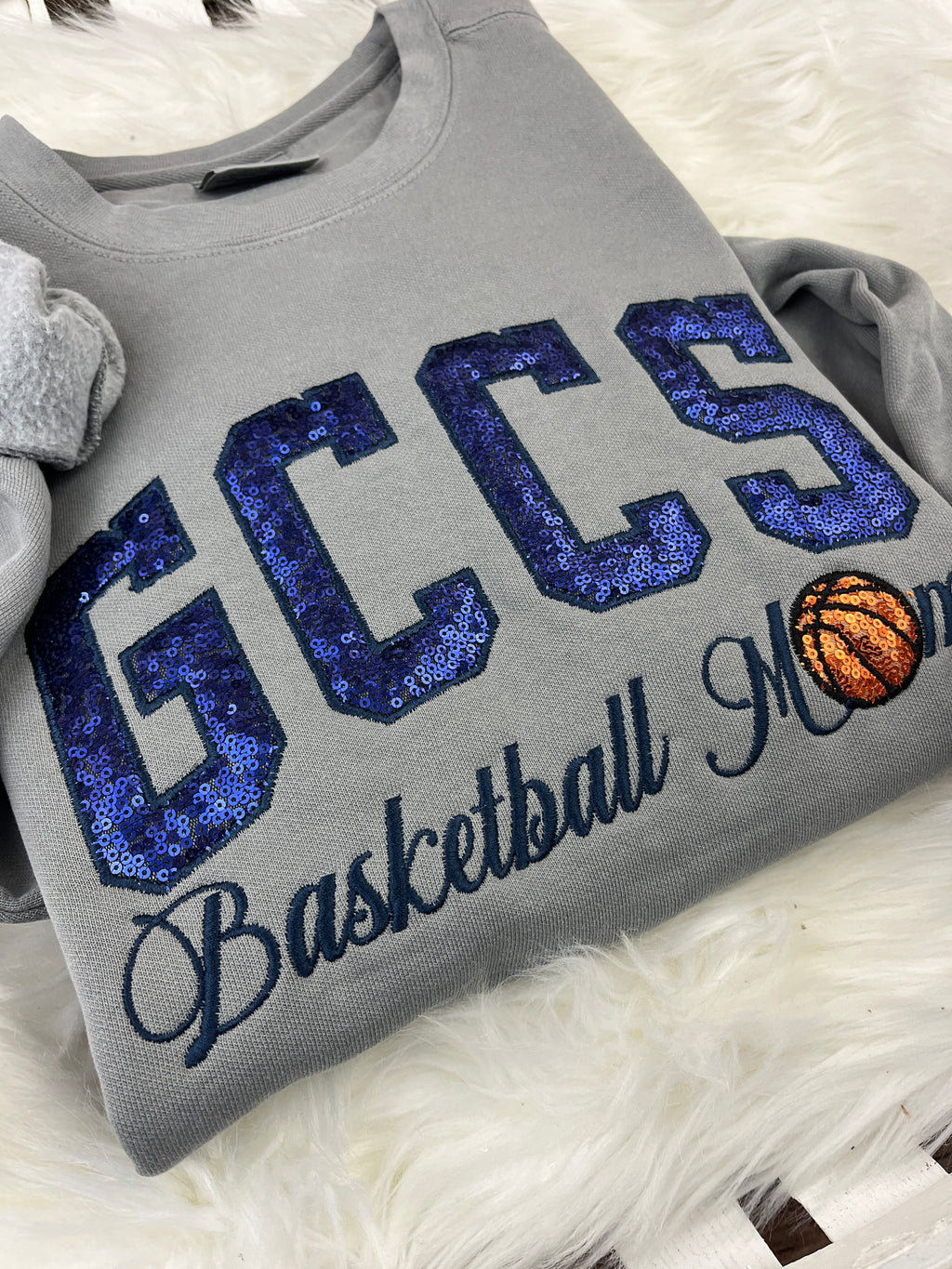 Basketball mom sweatshirt with navy sequin school lettering