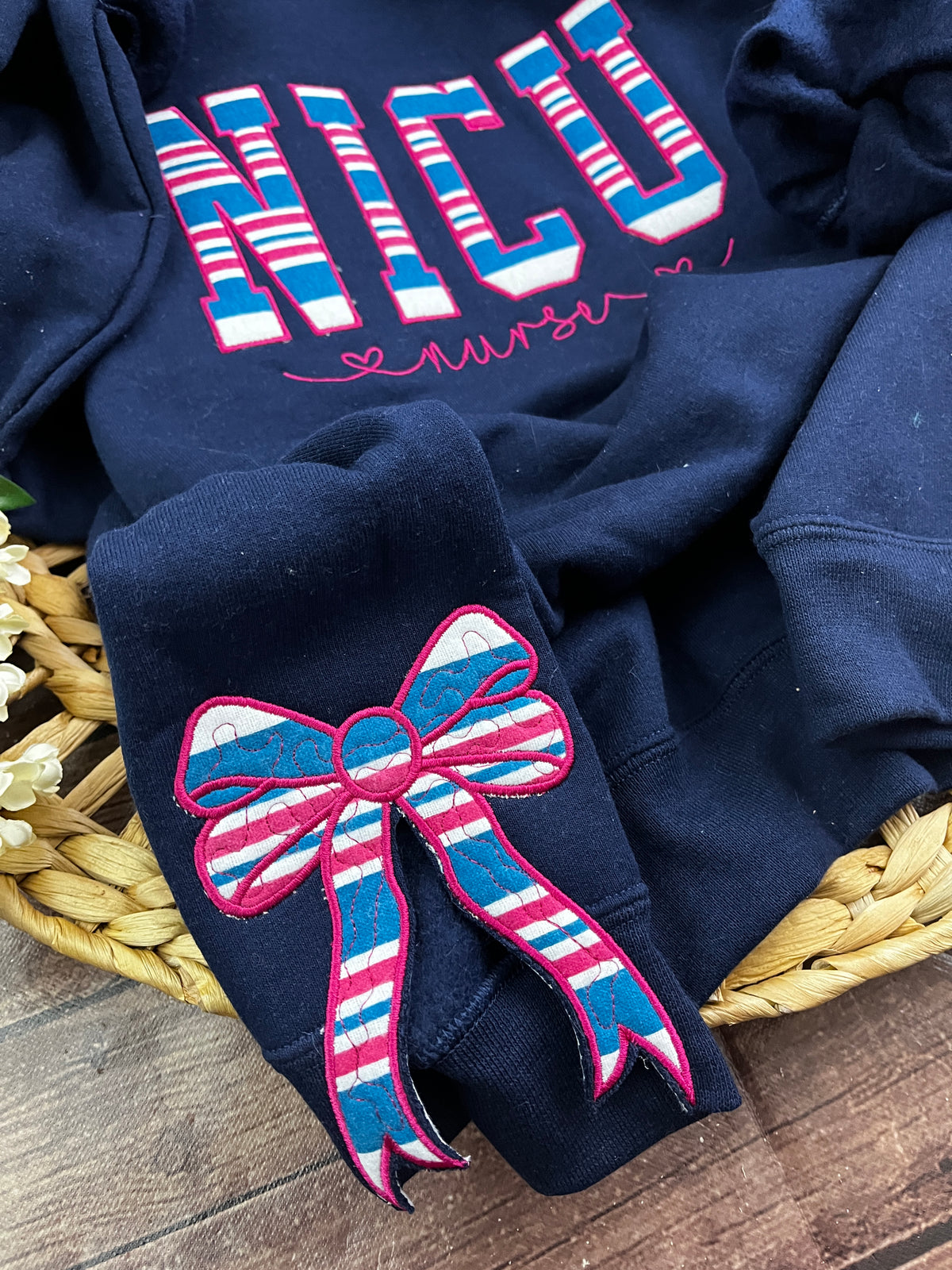 Add on side bows made from baby clothes for a keepsake sweatshirt - fabric detail