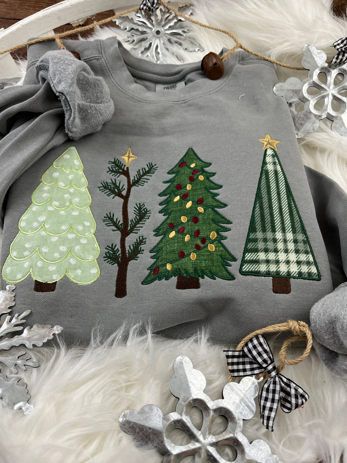 Christmas tree applique sweatshirt with embroidered holiday tree design - detail view