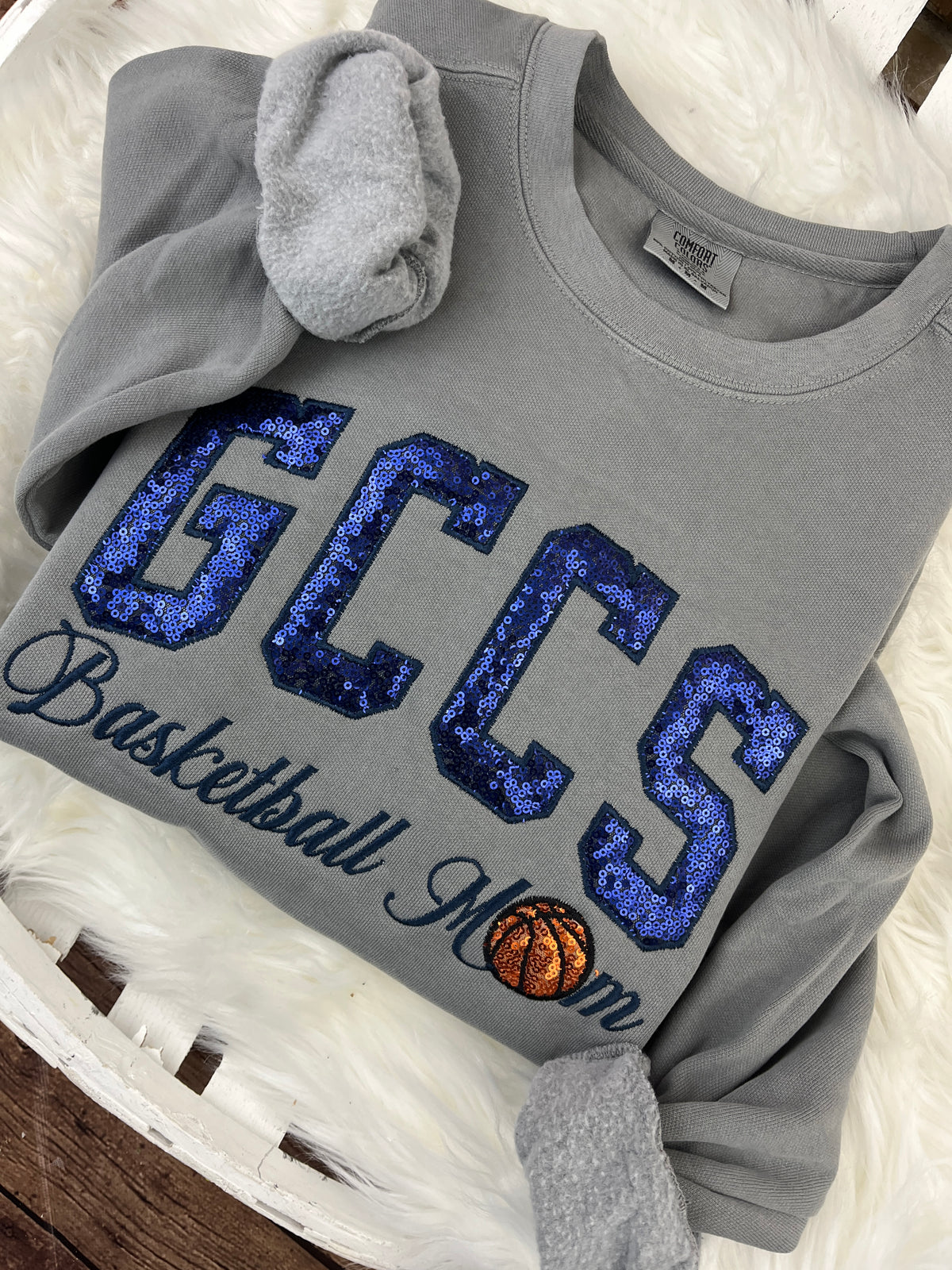 Basketball mom sweatshirt with navy sequin school lettering - detail view