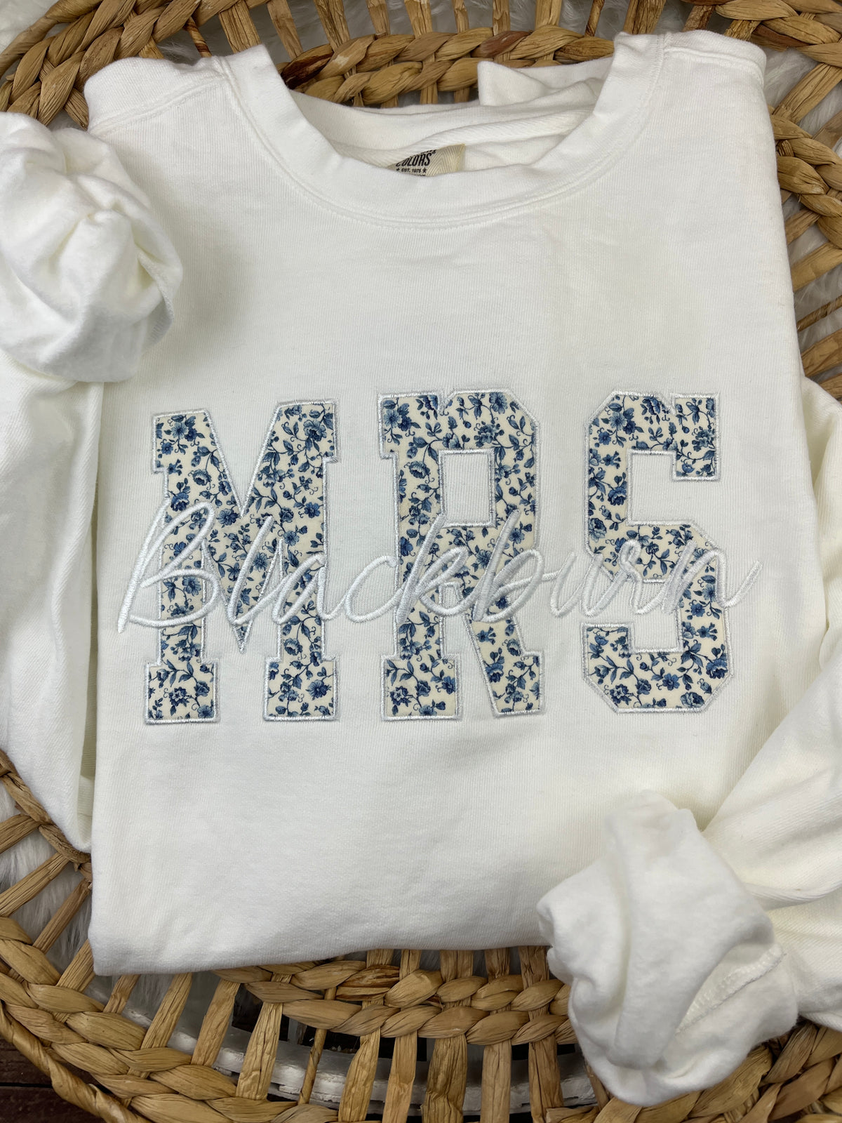 MRS embroidered sweatshirt in blue and cream monotone lettering - detail view