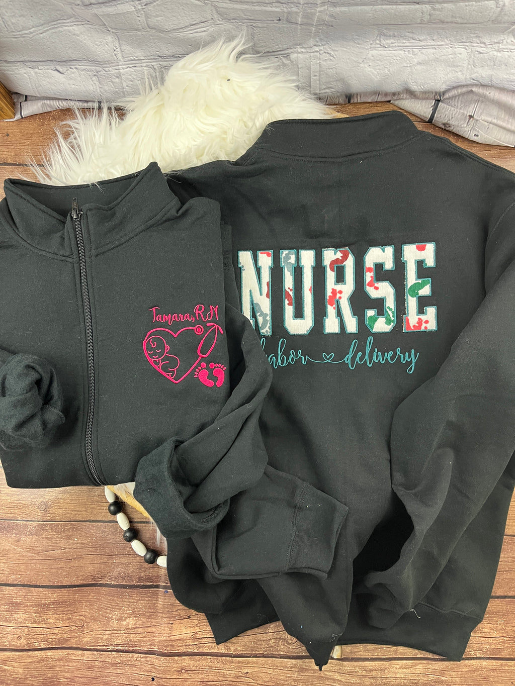 Nurse quarter zip sweatshirt made with a baby hospital swaddle blanket
