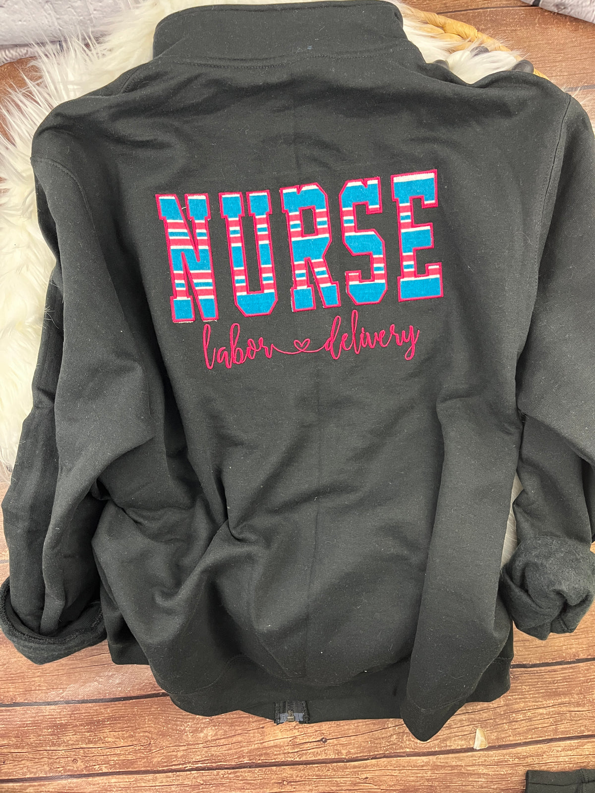 Nurse quarter zip sweatshirt made with a baby hospital swaddle blanket - detail view 5