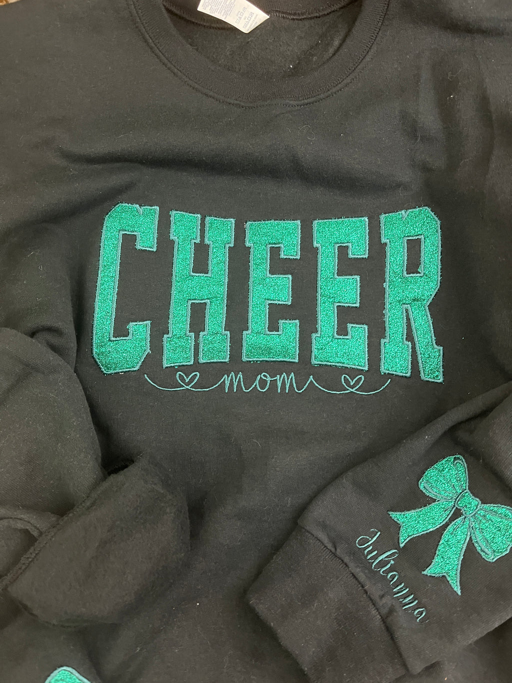 Custom cheer mom sweatshirt with side bows and glitter embroidery - fabric detail