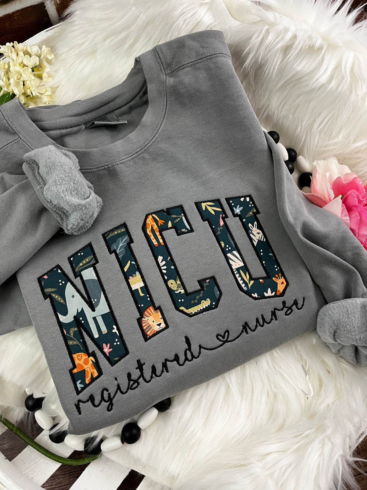 Curved NICU nurse keepsake sweatshirt from a baby swaddle blanket - alternate view