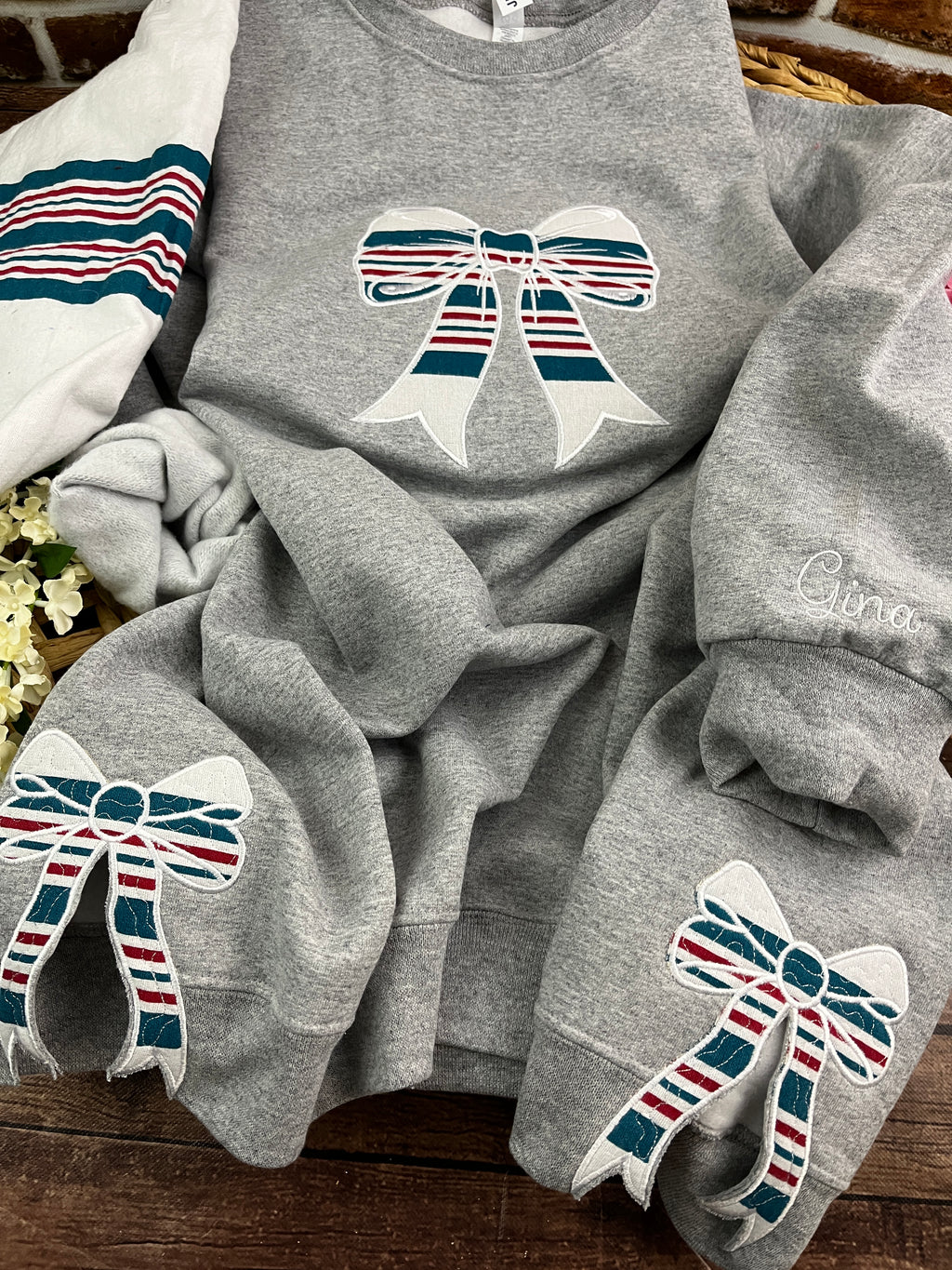 Nurse bow sweatshirt with side bows from a hospital swaddle blanket - detail view
