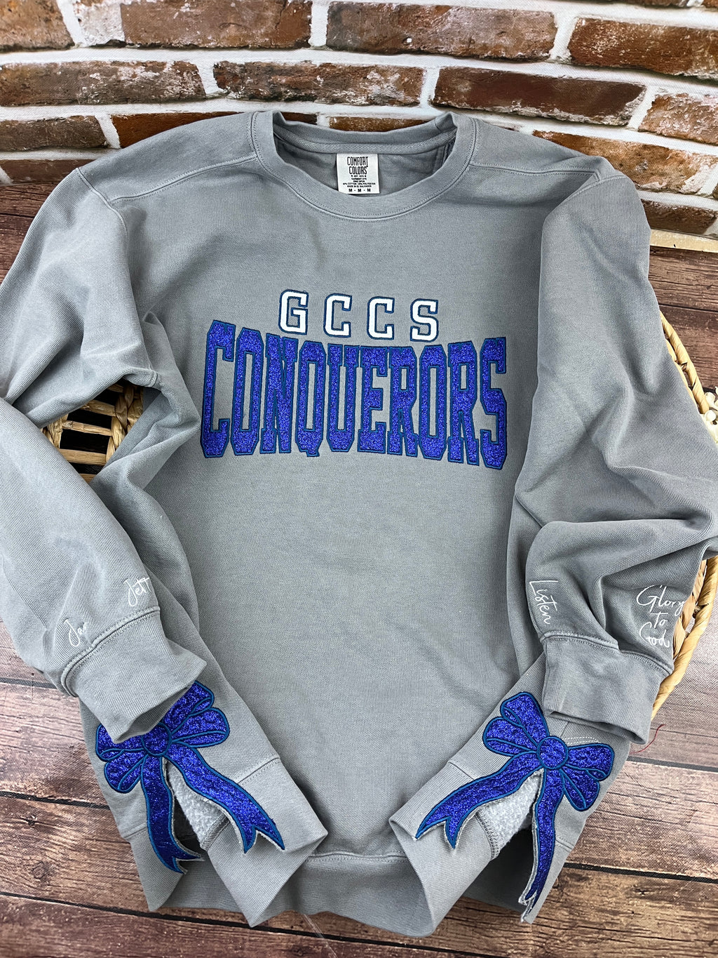 School spirit team sweatshirt with glitter applique and side bows