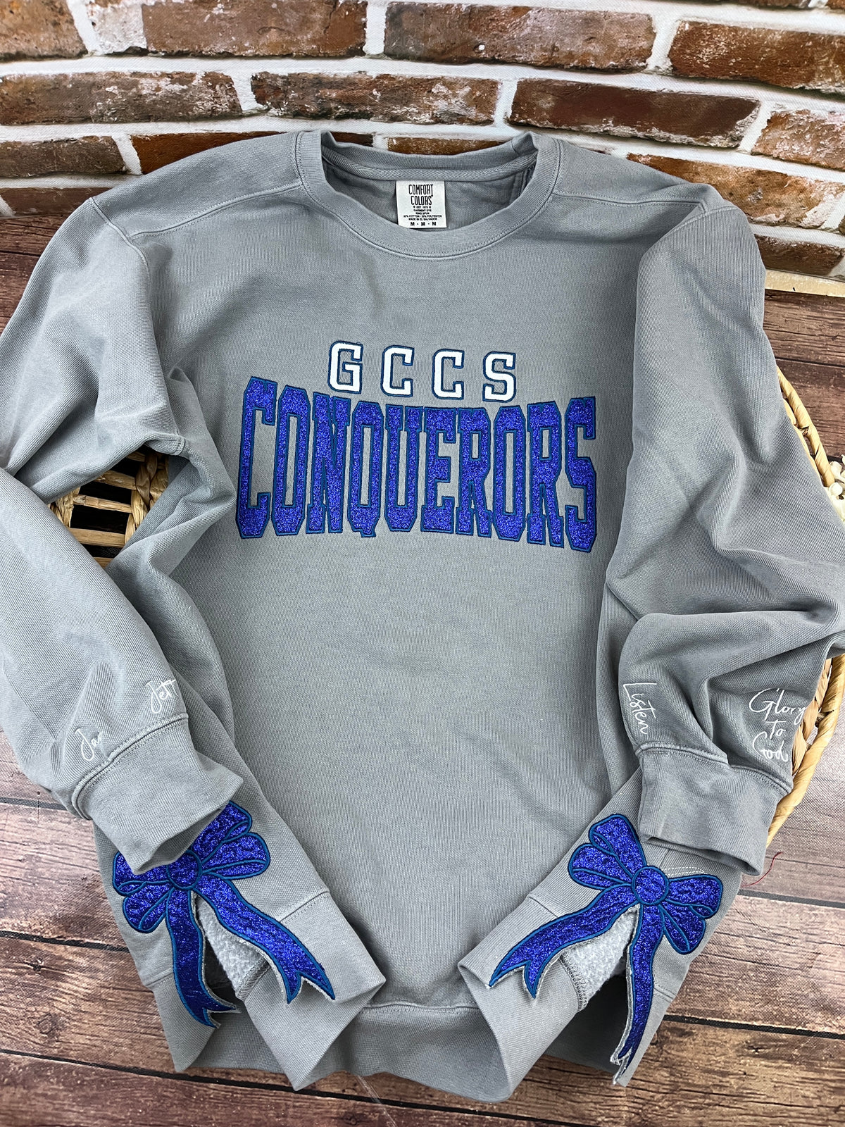 School spirit team sweatshirt with glitter applique and side bows