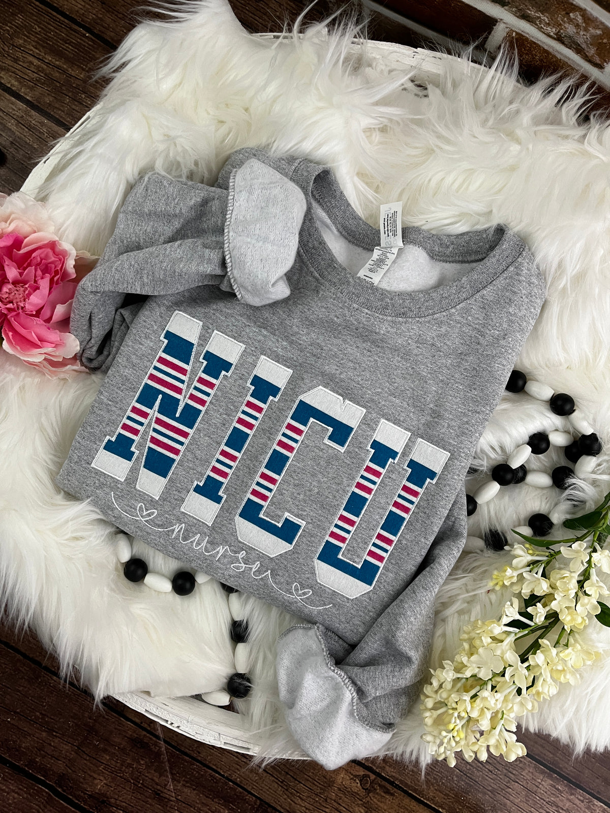 NICU nurse keepsake sweatshirt appliqued from a baby hospital blanket - detail view