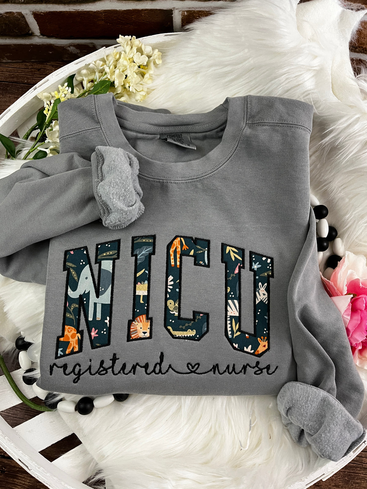 Curved NICU nurse keepsake sweatshirt from a baby swaddle blanket