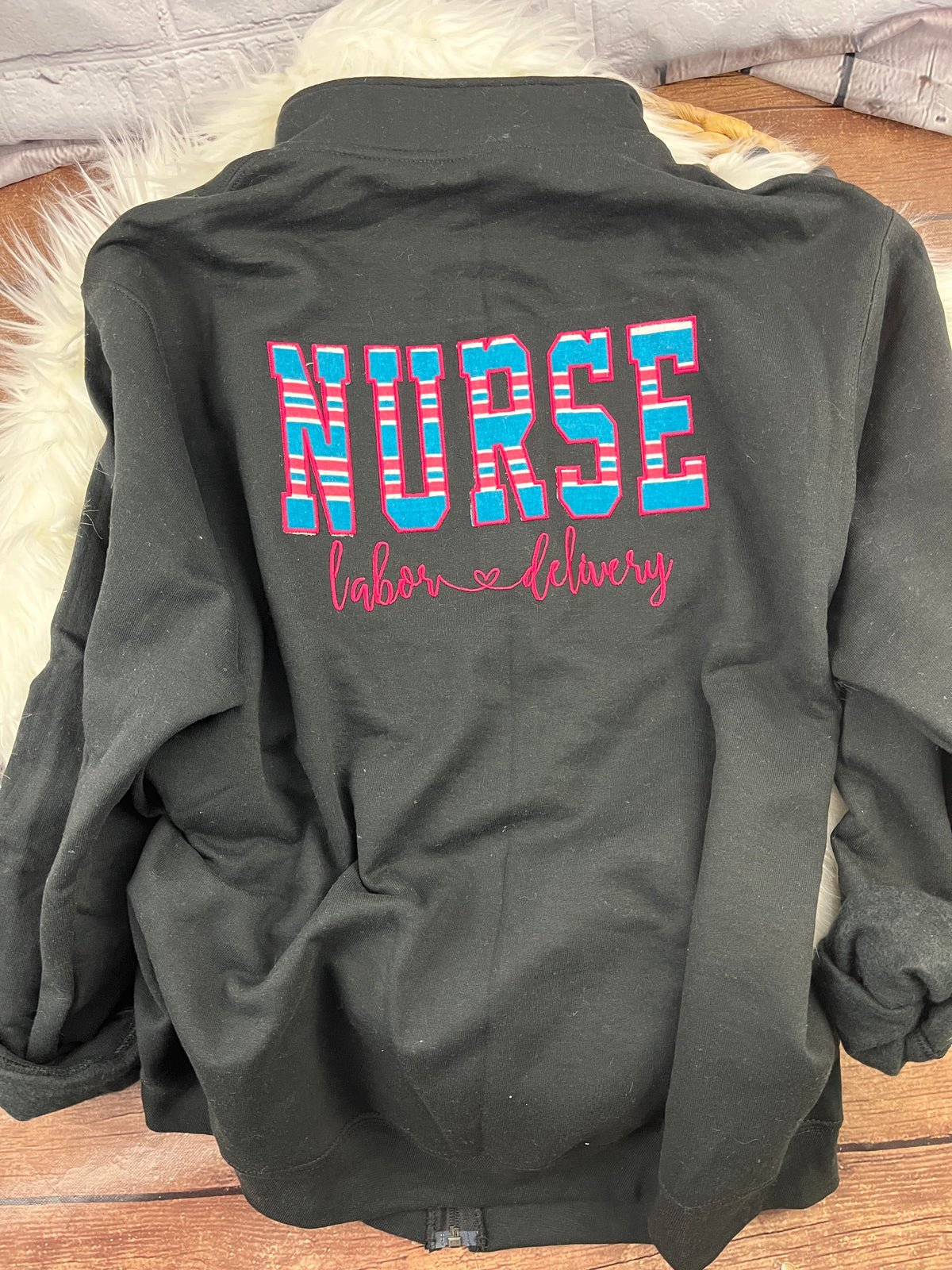 Nurse quarter zip sweatshirt made with a baby hospital swaddle blanket - detail view 6