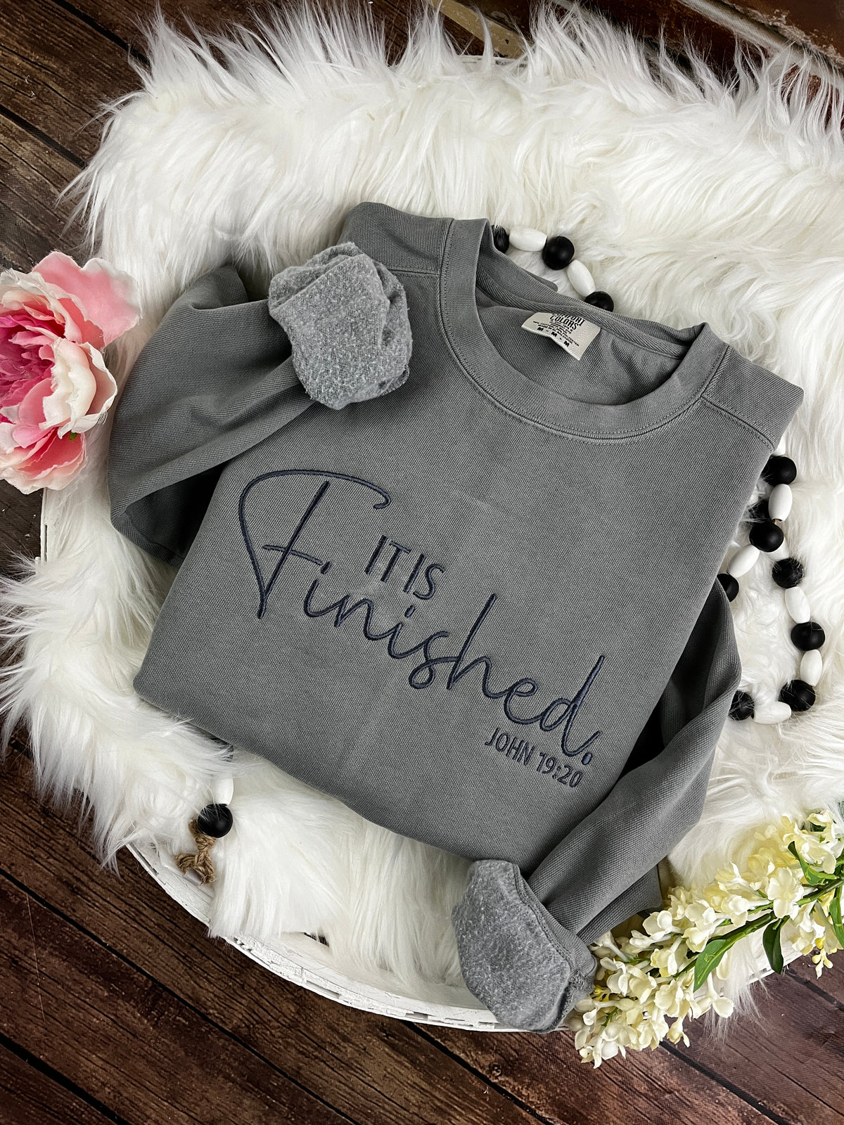 It is finished embroidered Easter scripture shirt