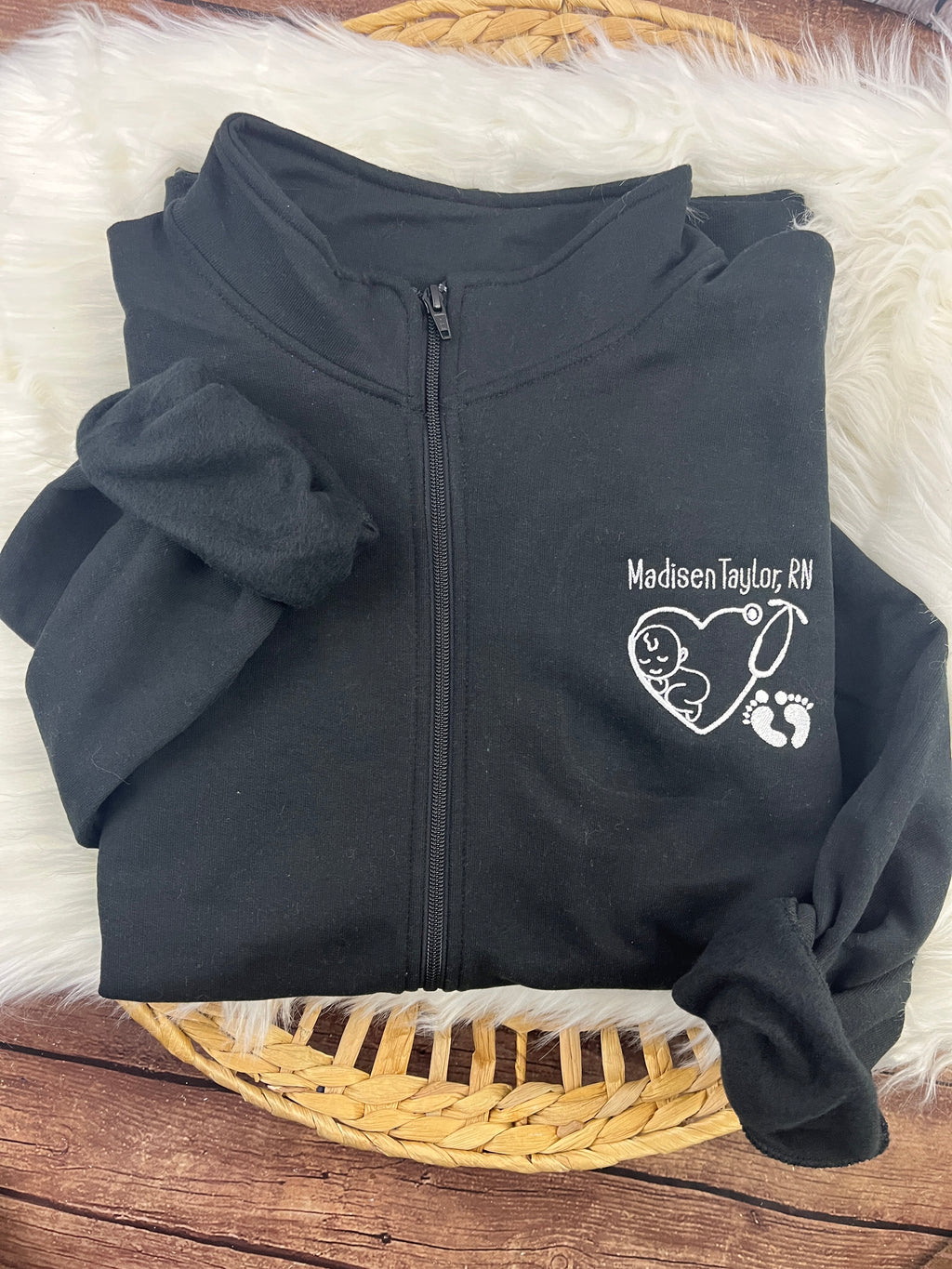 Nurse quarter zip sweatshirt with bow detail from a swaddle blanket - detail view