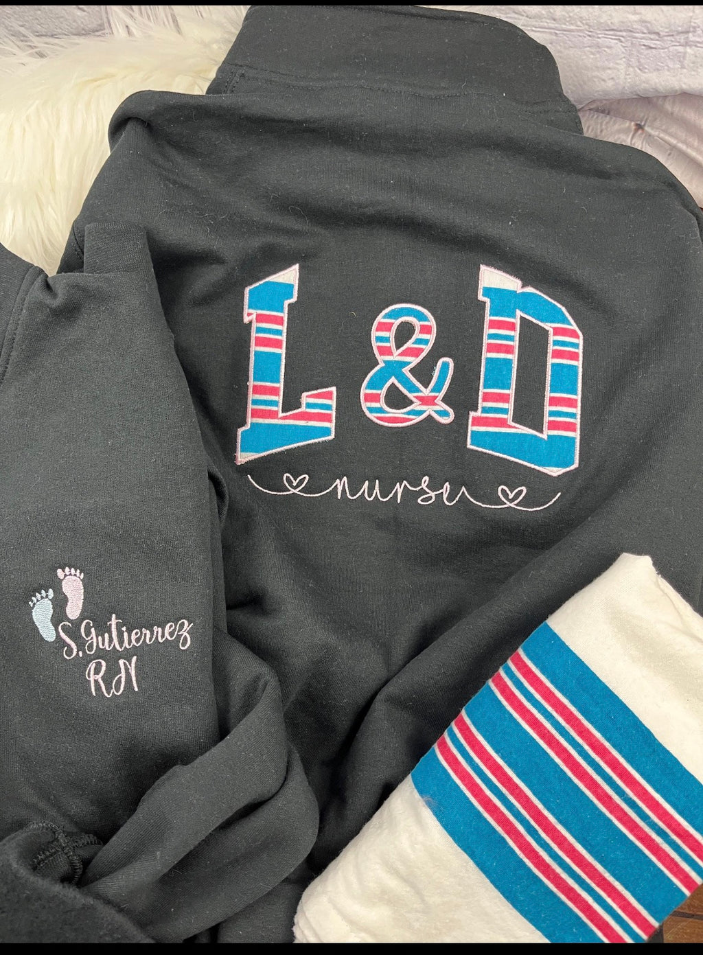 Labor and delivery nurse zip sweatshirt with baby swaddle blanket accent