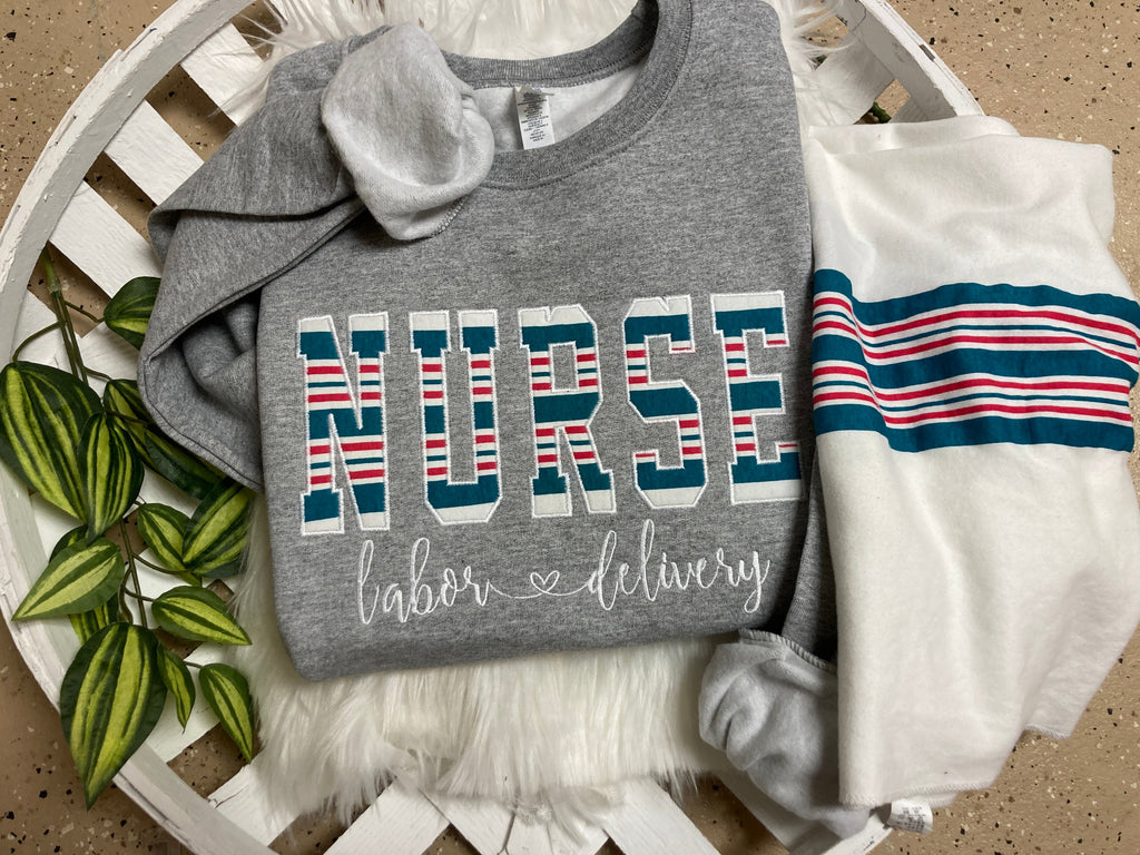 Bulk order nurse keepsake sweatshirts appliqued from hospital blankets - detail view