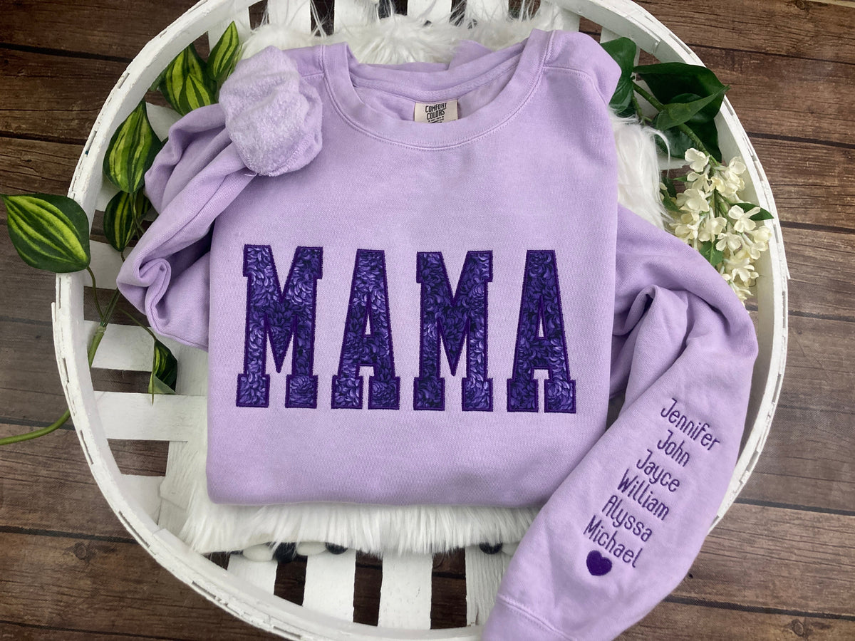 Keepsake mama sweatshirt appliqued from baby clothes and onesies - detail view