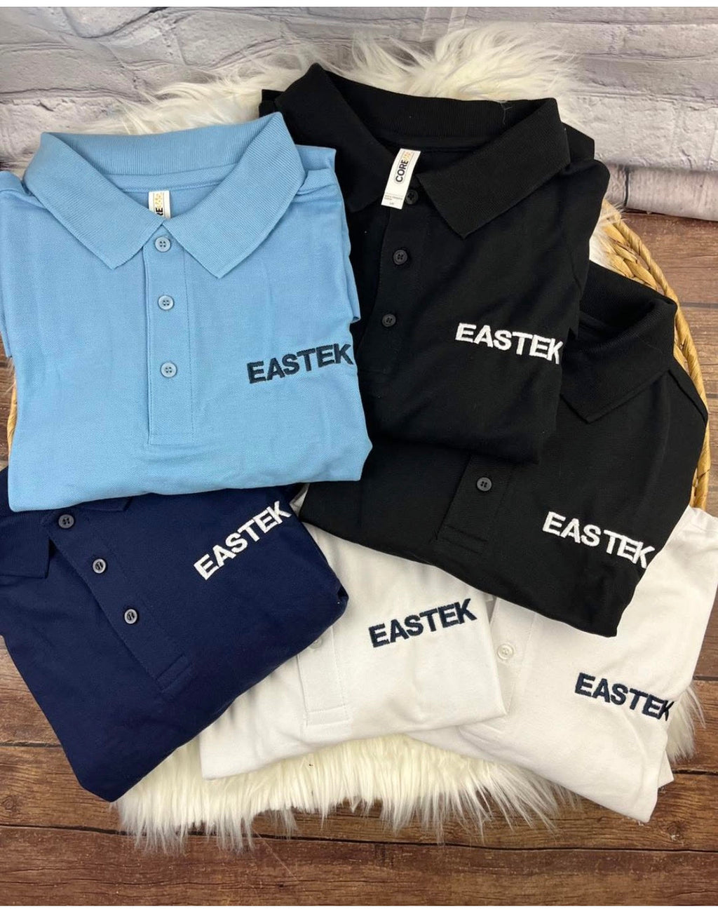 Eastek embroidered company logo apparel - finished shirts