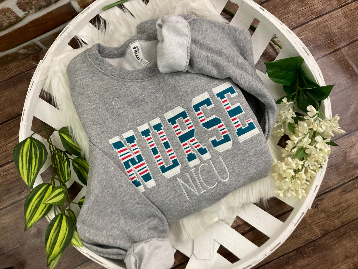 Bulk order nurse keepsake sweatshirts appliqued from hospital blankets - fabric detail