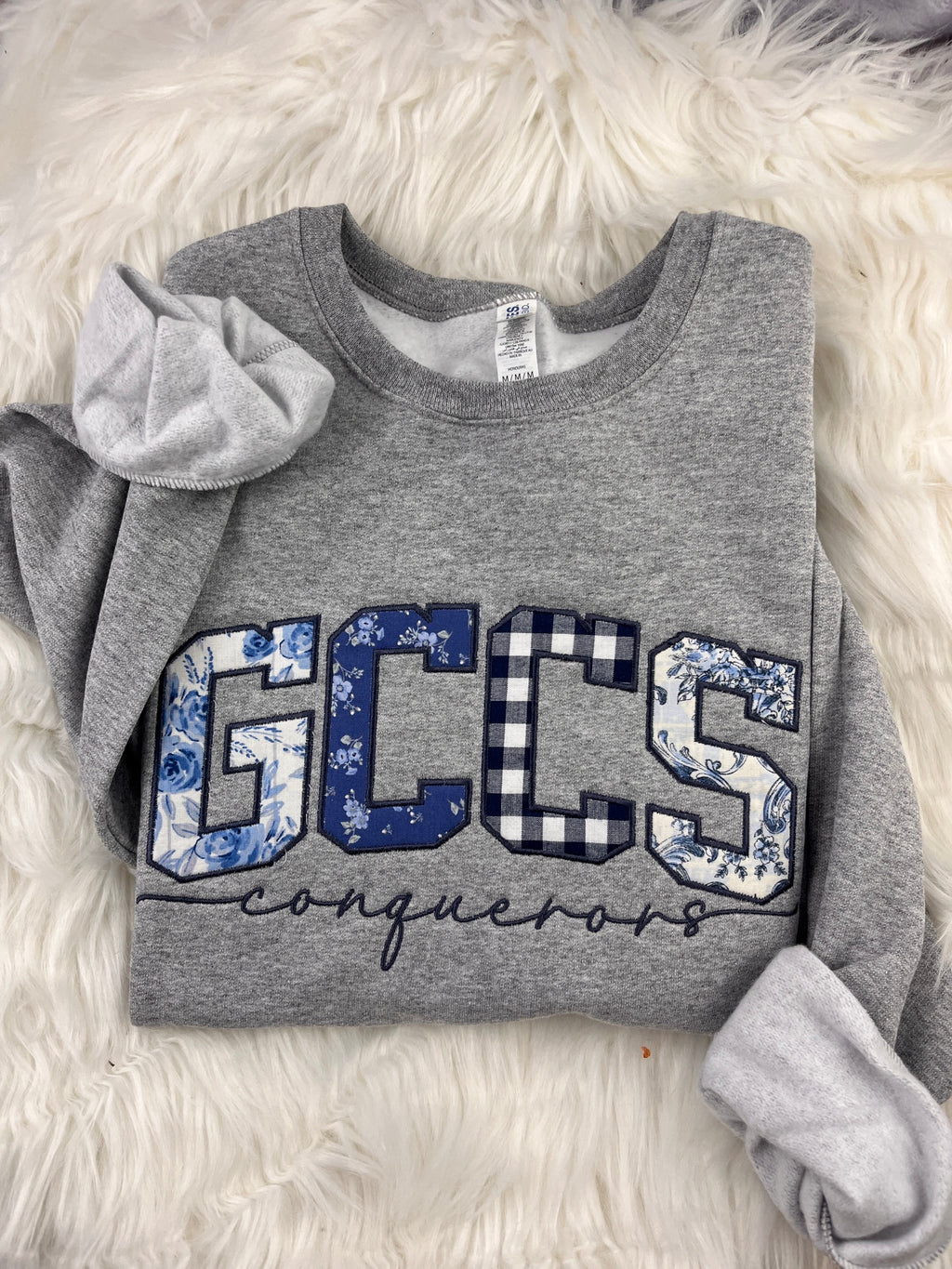 GCCS Conquerors appliqué sweatshirt detail