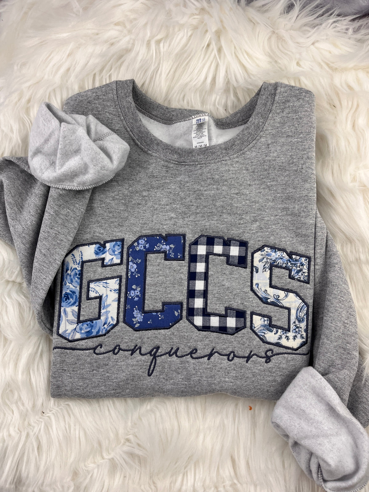GCCS Conquerors appliqué sweatshirt detail
