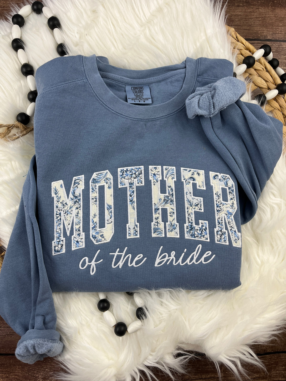 Mother of the bride shirt with floral applique detail