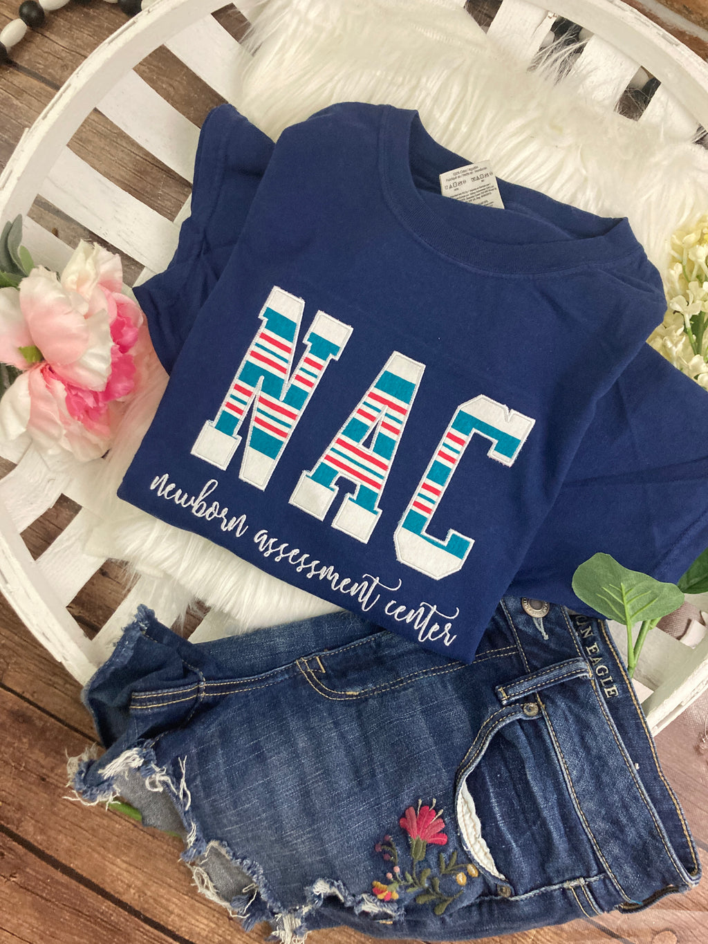 Bulk NAC nurse keepsake sweatshirts appliqued from hospital baby blankets - detail view