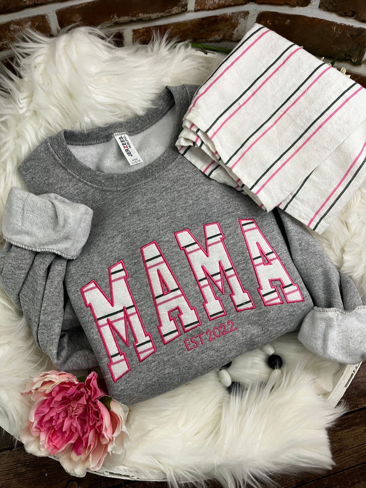 Curved MAMA embroidered sweatshirt made from a hospital swaddle blanket - fabric detail