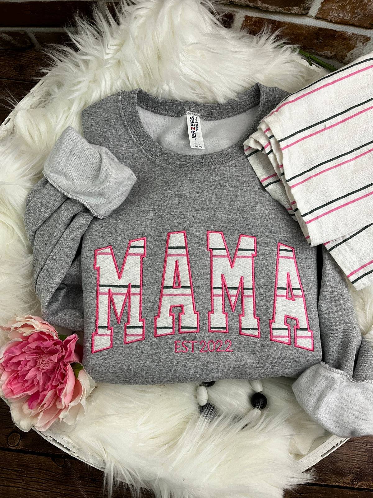 Curved MAMA embroidered sweatshirt made from a hospital swaddle blanket - second detail view
