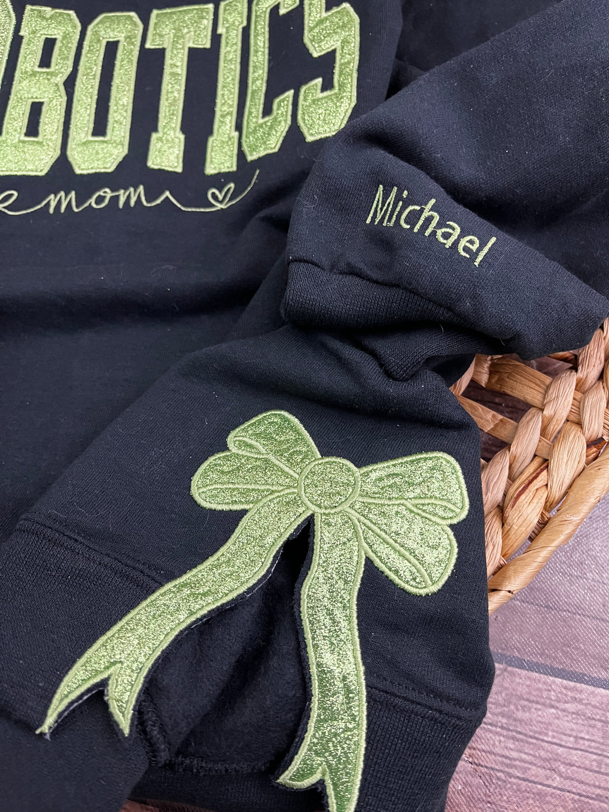 Custom robotics mom glitter embroidered sweatshirt with side bows - close up view
