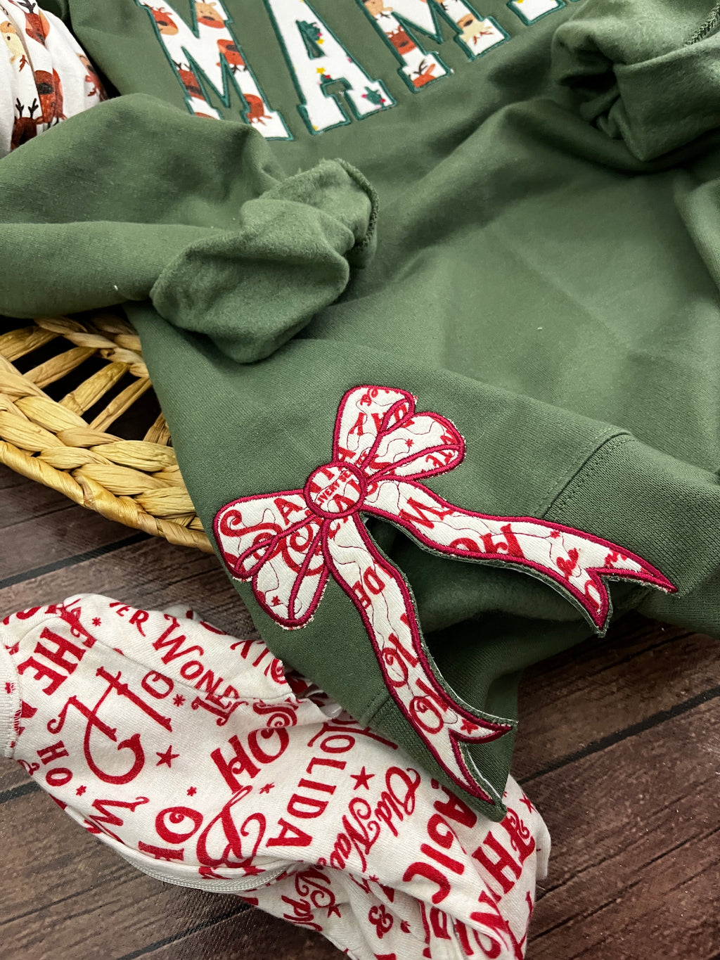 Mama keepsake sweatshirt with side bows appliqued from baby clothes - close up view