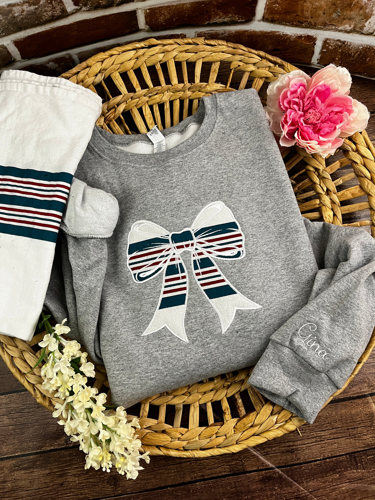 Nurse bow sweatshirt appliqued from a baby hospital swaddle blanket - detail view