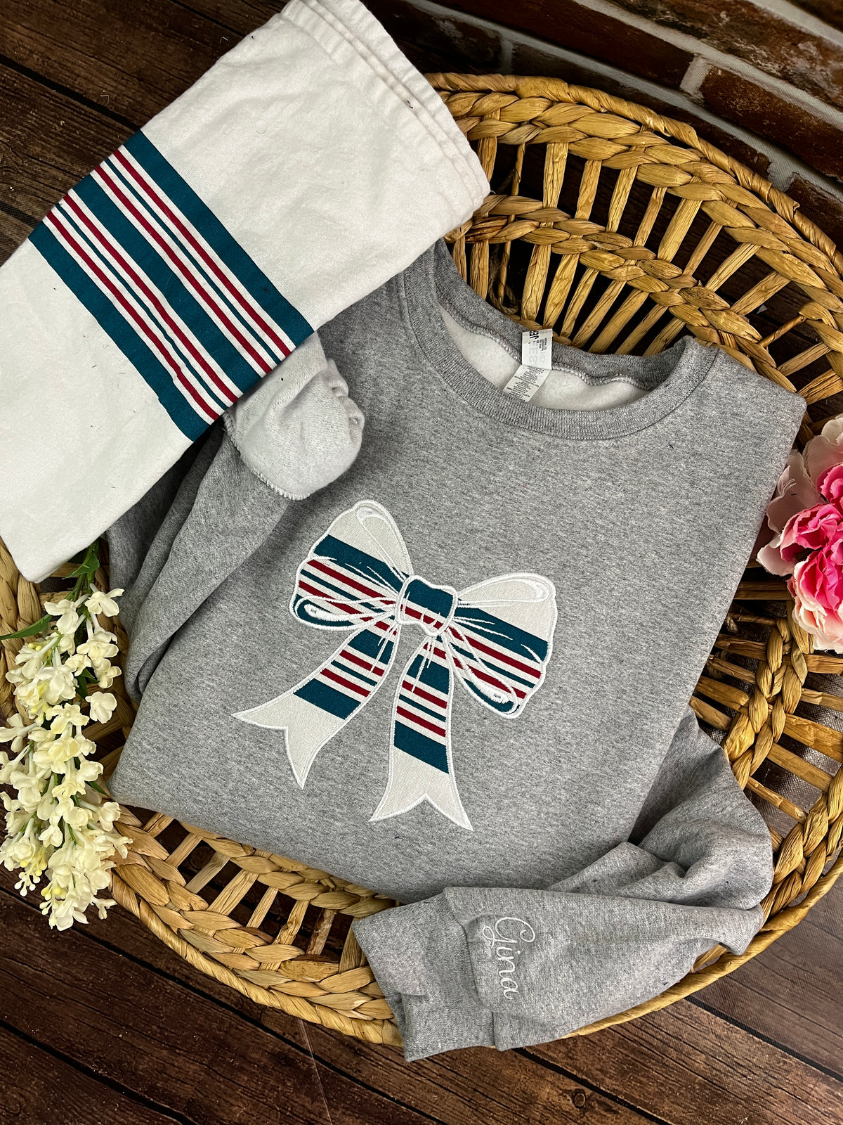 Nurse bow sweatshirt appliqued from a baby hospital swaddle blanket