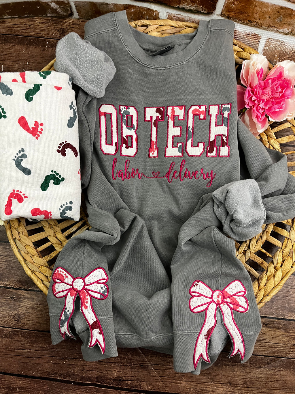 OB tech nurse sweatshirt with side bows from a hospital swaddle blanket