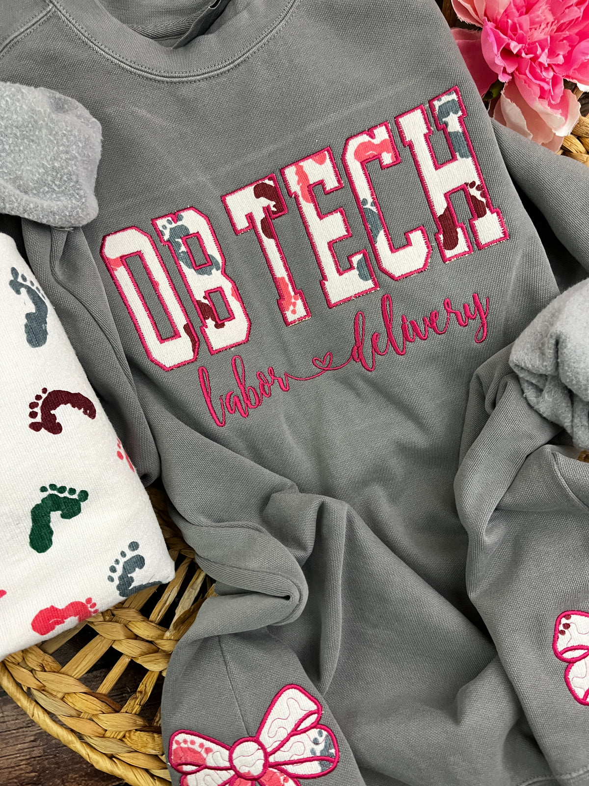 OB tech nurse sweatshirt with side bows from a hospital swaddle blanket - detail view