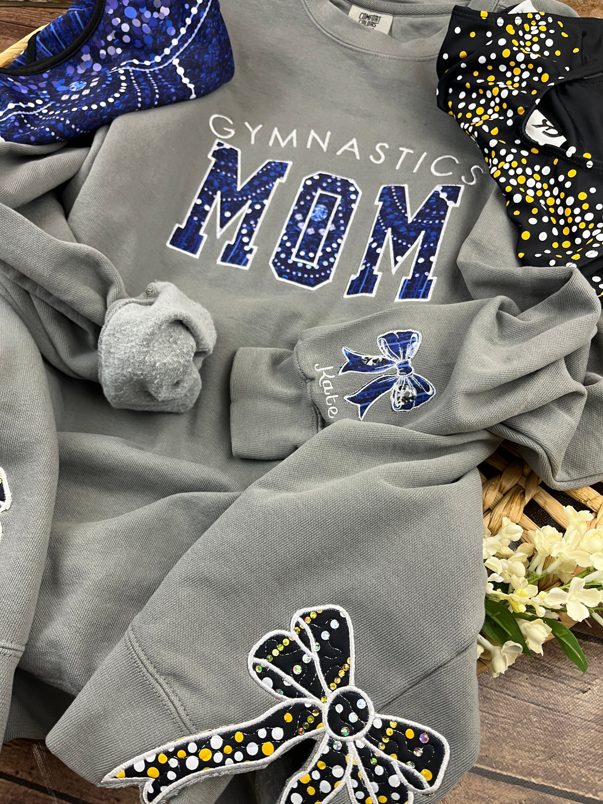 Custom gymnastics mom sweatshirt with leotard applique - close up view