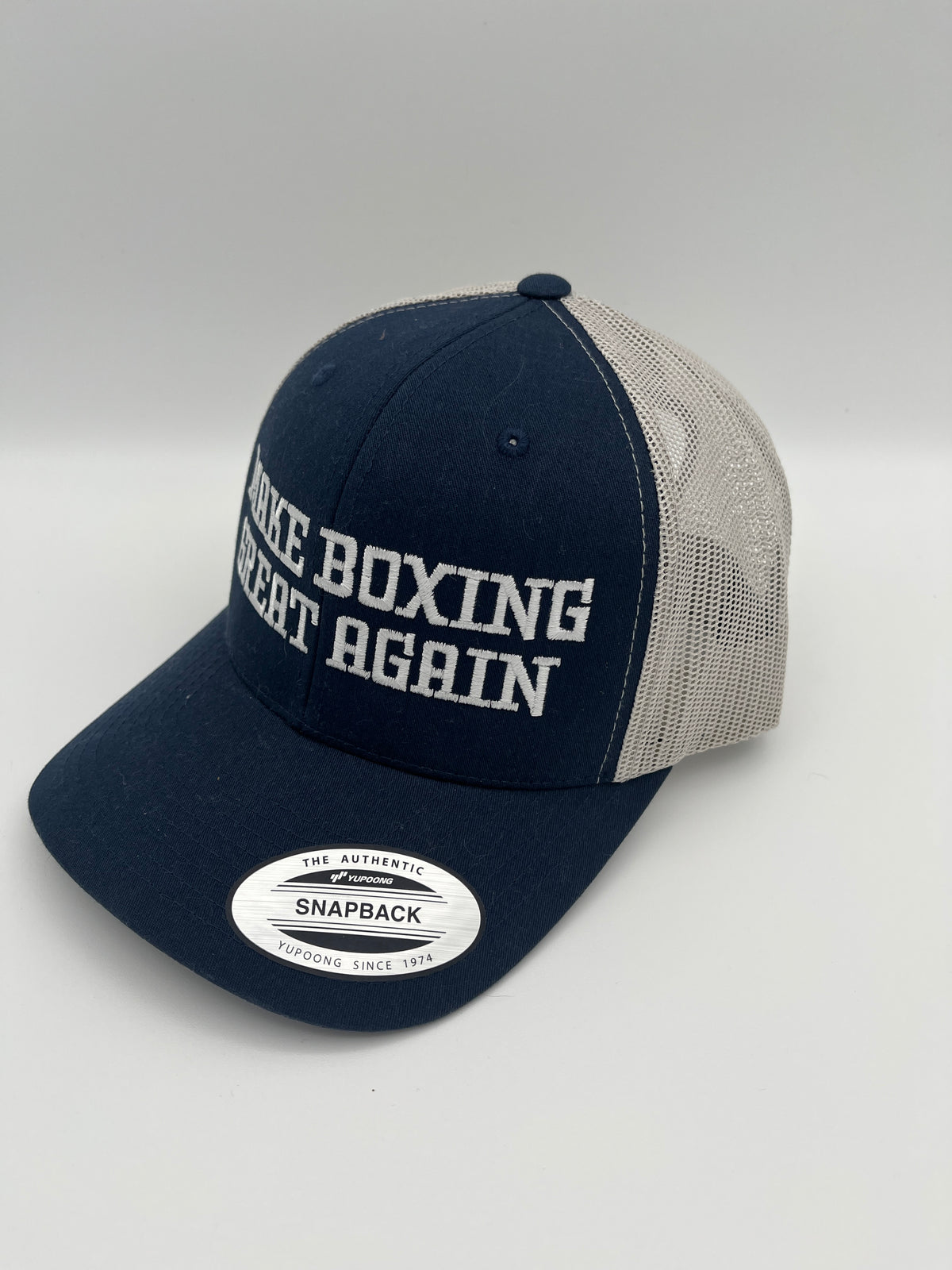 Boxing slogan embroidered adjustable trucker cap - detail view