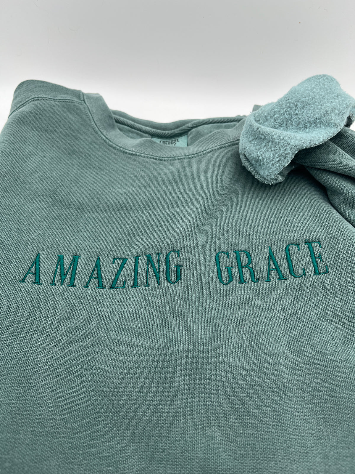 Amazing Grace embroidered hymn Christian sweatshirt - detail view