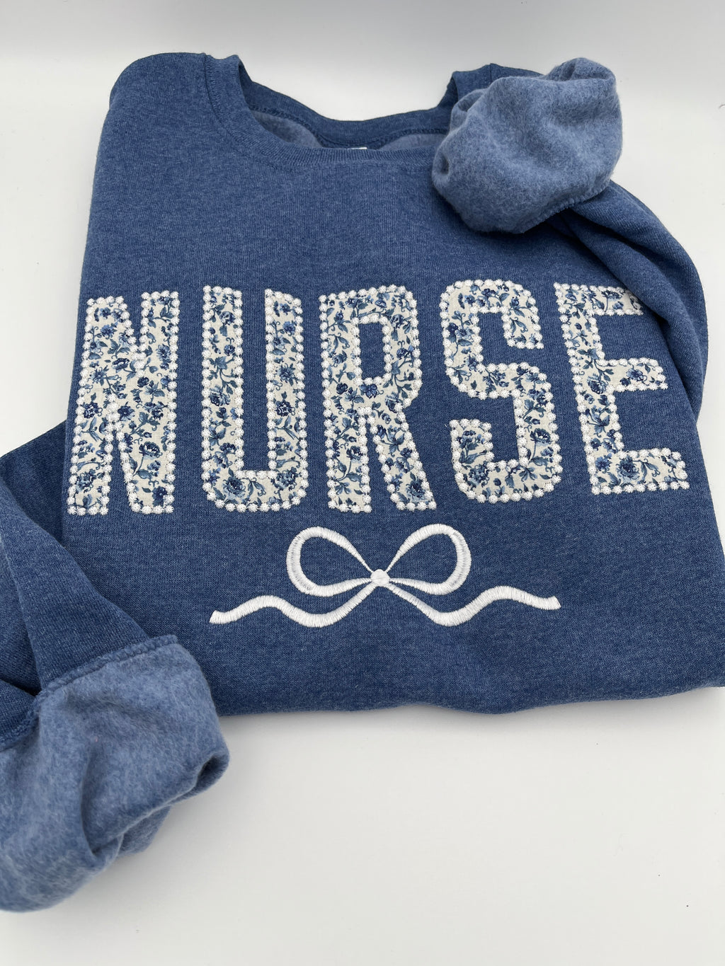 Coquette nurse sweatshirt with applique and embroidered bow