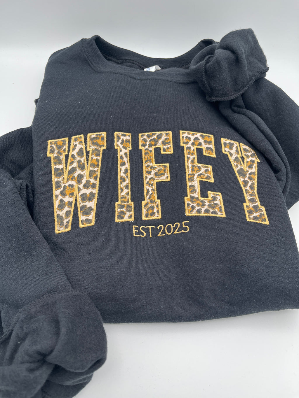 Curved WIFEY applique sweatshirt with cheetah print lettering and custom year