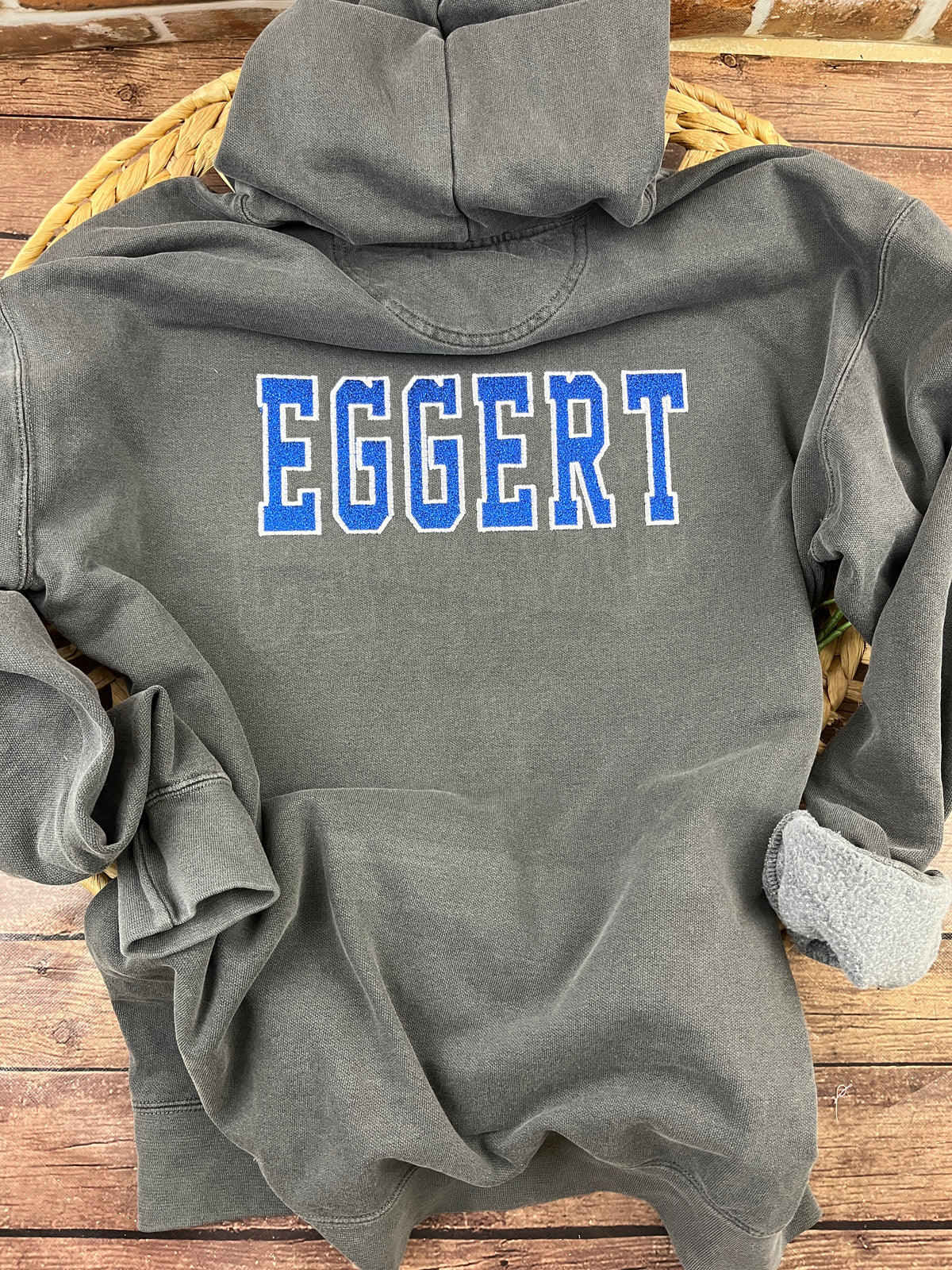 Custom lacrosse sweatshirt with glitter applique school name embroidery - detail view 3