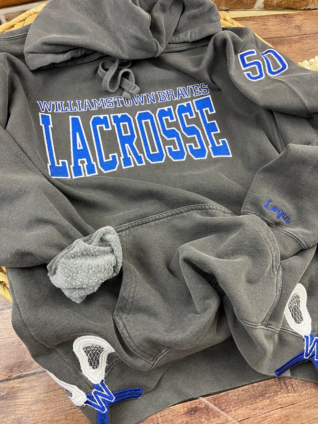 Custom lacrosse sweatshirt with glitter applique school name embroidery - detail view 6