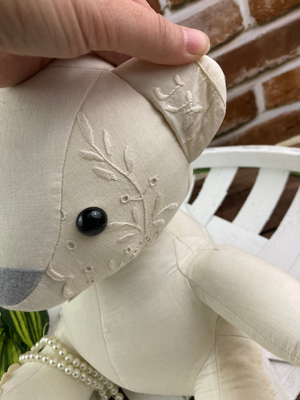 Memory bear handmade from a loved ones clothing - draped view