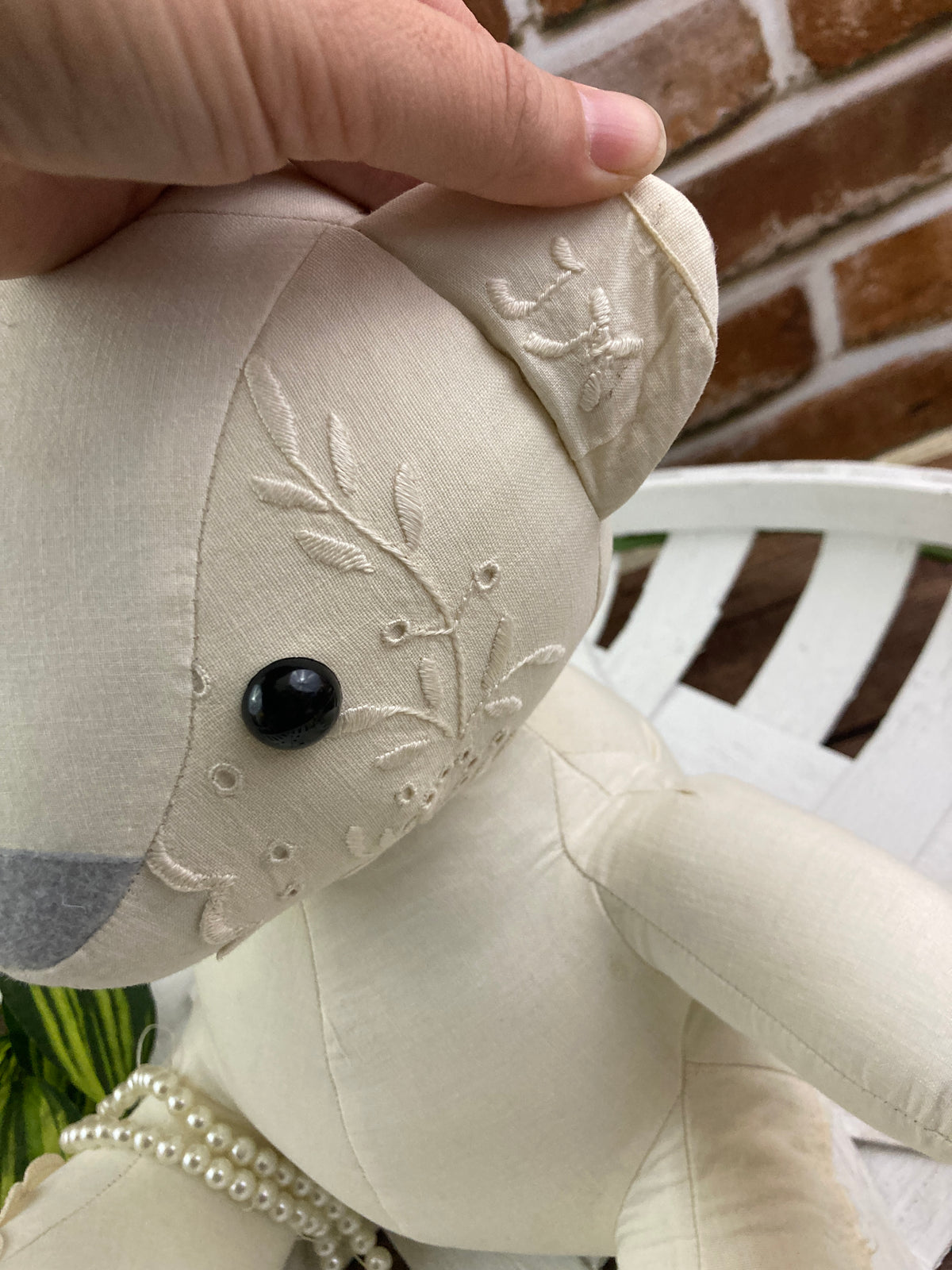 Memory bear handmade from a loved ones clothing - draped view