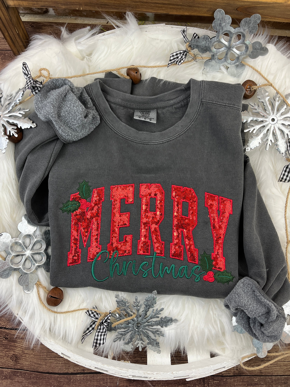 MERRY sequin Christmas sweatshirt in curved script with holly berries - detail view