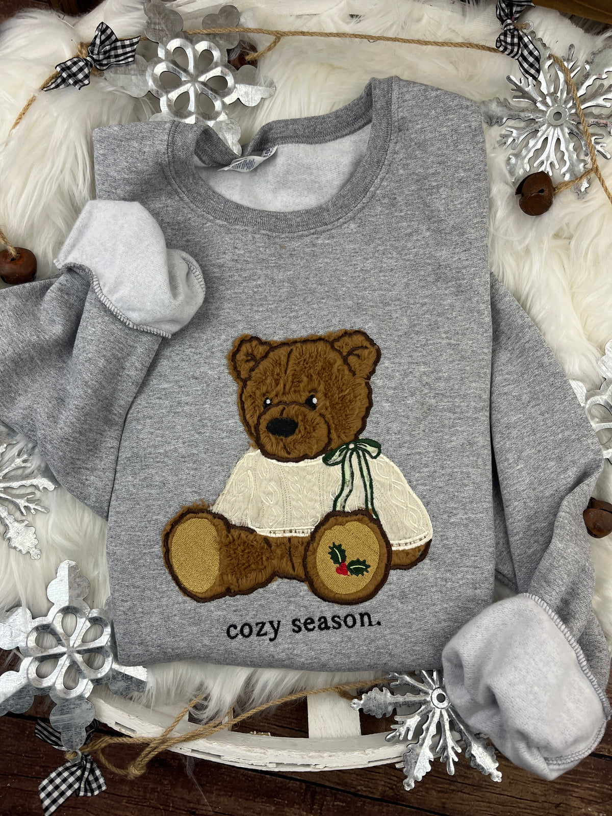Christmas bear sweatshirt with brown sherpa applique and holly paw design - detail view 4