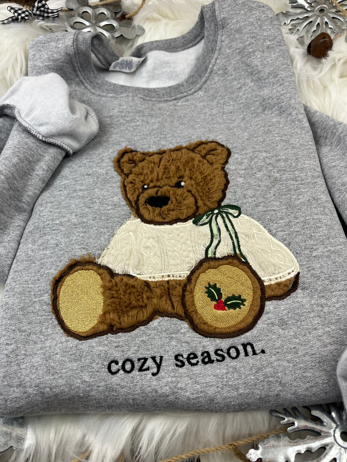 Christmas bear sweatshirt with brown sherpa applique and holly paw design - detail view 3