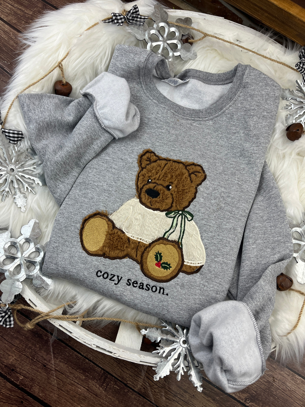 Christmas bear sweatshirt with brown sherpa applique and holly paw design